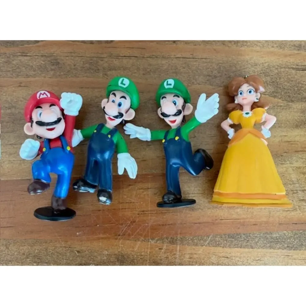 Nintendo Super Mario Figures 2007 - Mario, 2 Luigi figures and Princess Daisy
